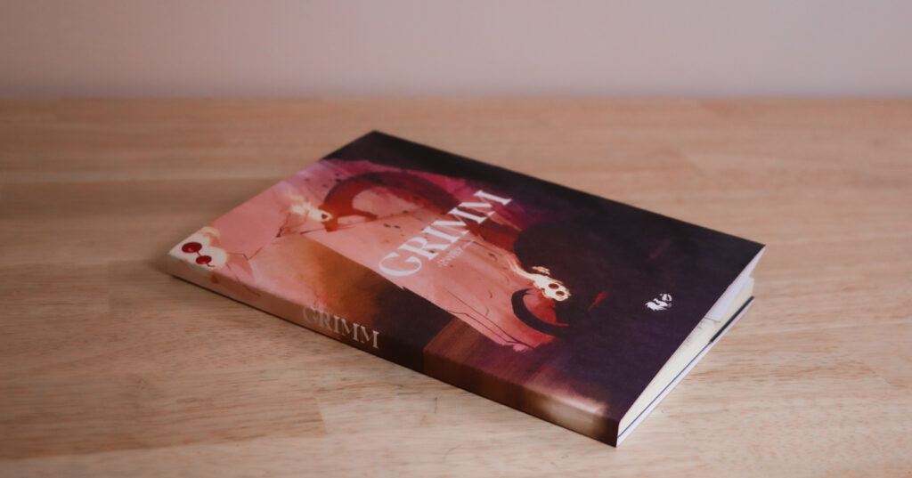Mockup de la couverture de l'art book Grimm basé sur l'univers de la série RWBY